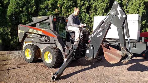 bradco skid steer backhoe attachment|bradco 609 backhoe attachment.